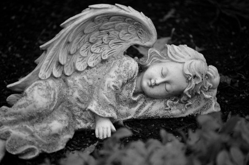 grayscale photo of cherubim angel