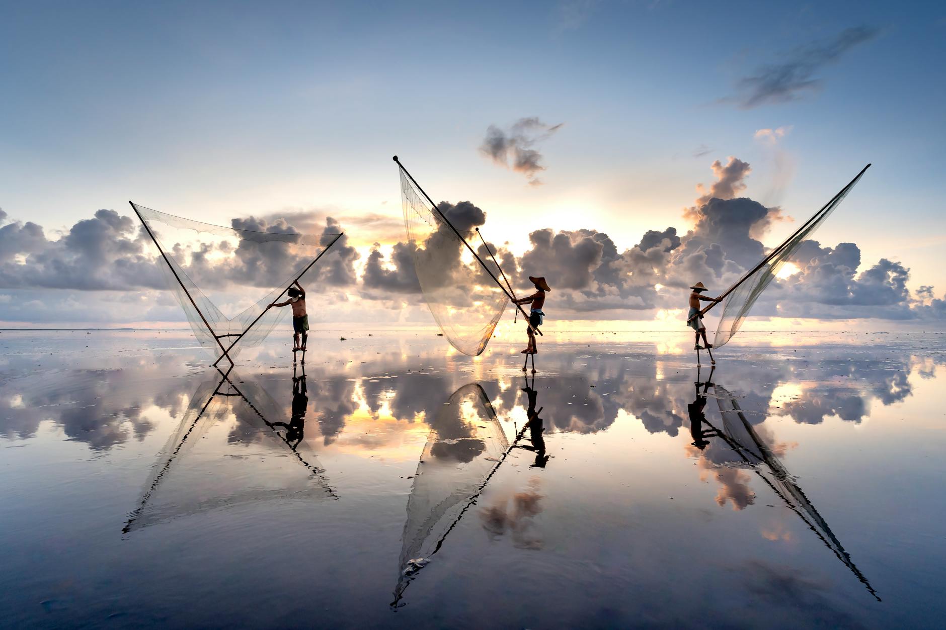 fishermen fishing with their nets