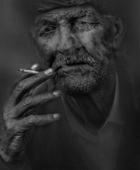 man smoking cigarette