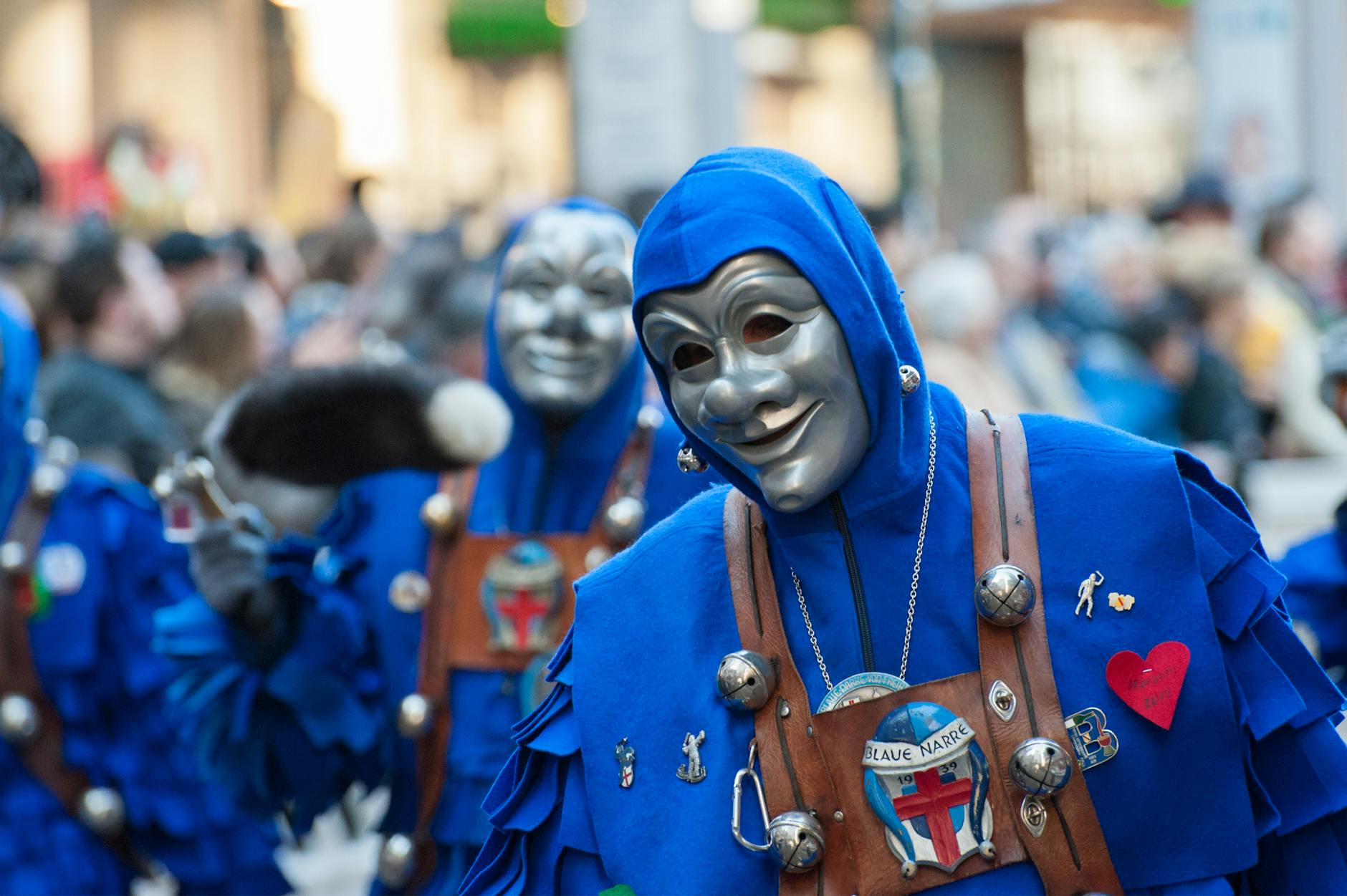 person wearing gray mask