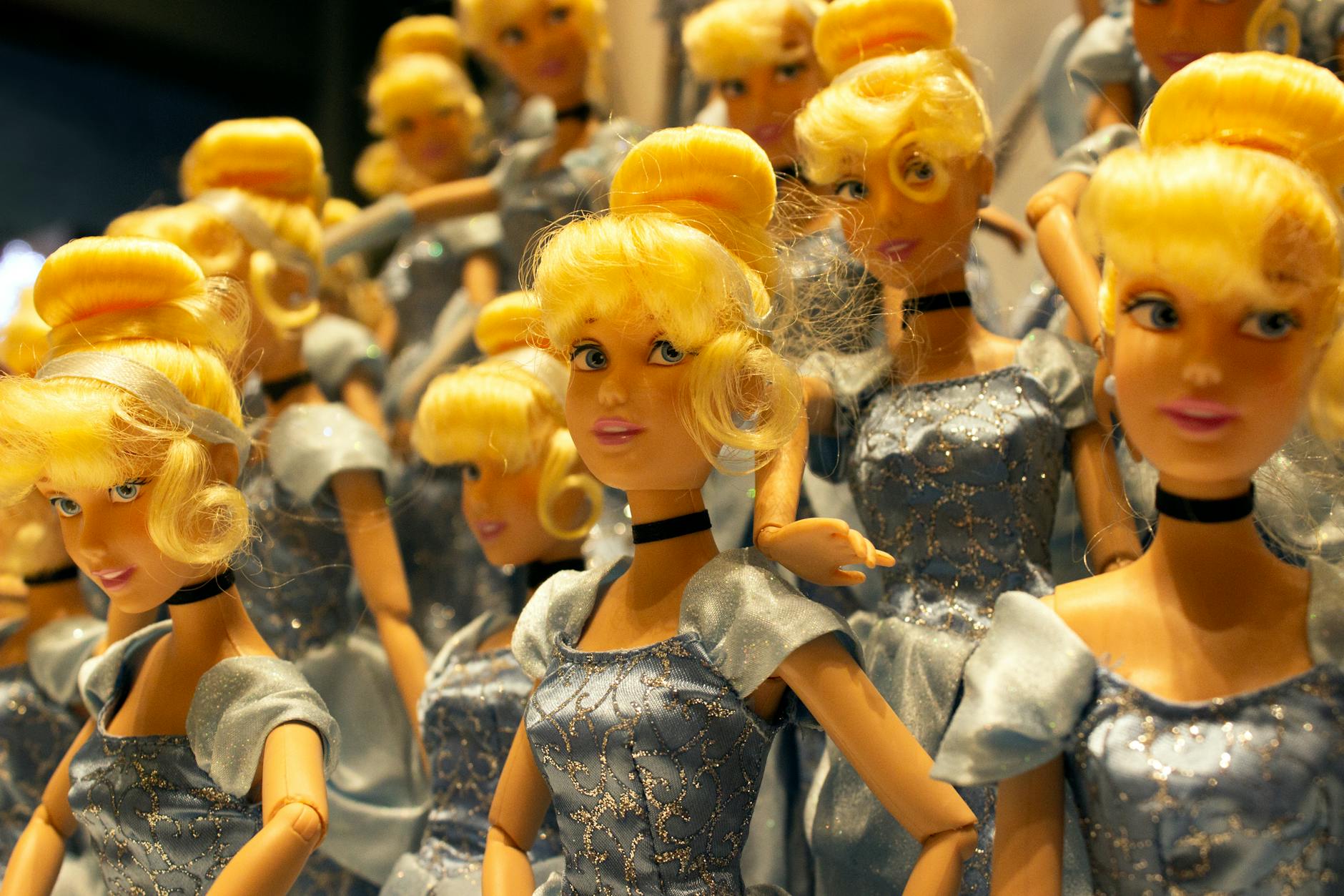 yellow haired dolls in blue dress