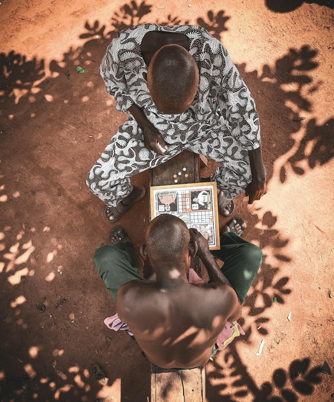 top view photo of men playing board game