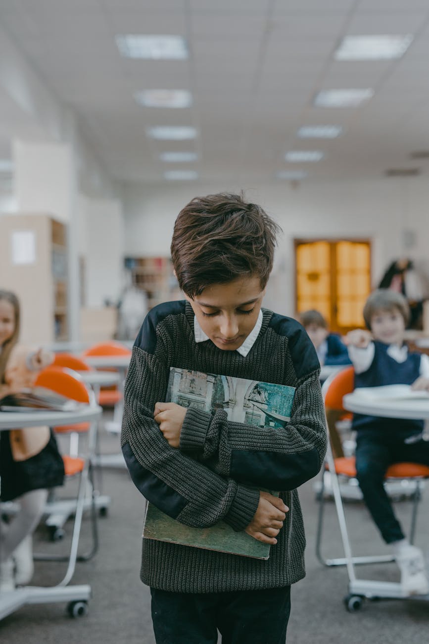 a boy getting bullied in class