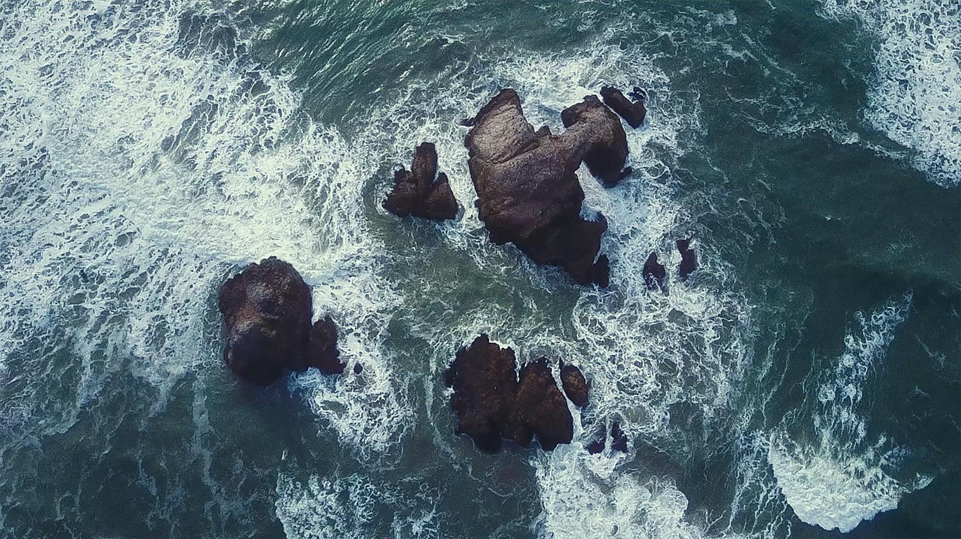 splashing wave on rock