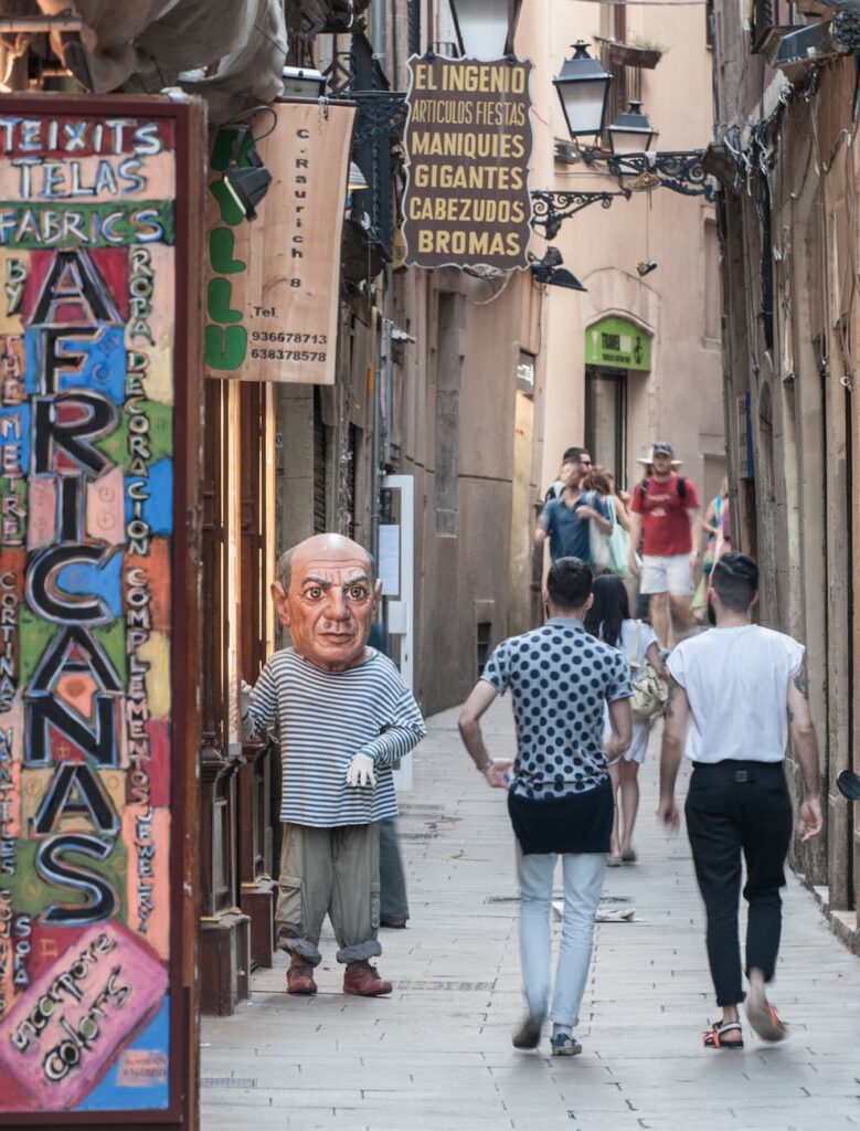 person in picasso mask standing in alley