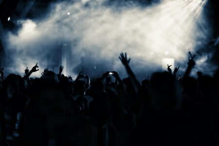 people raising their hands