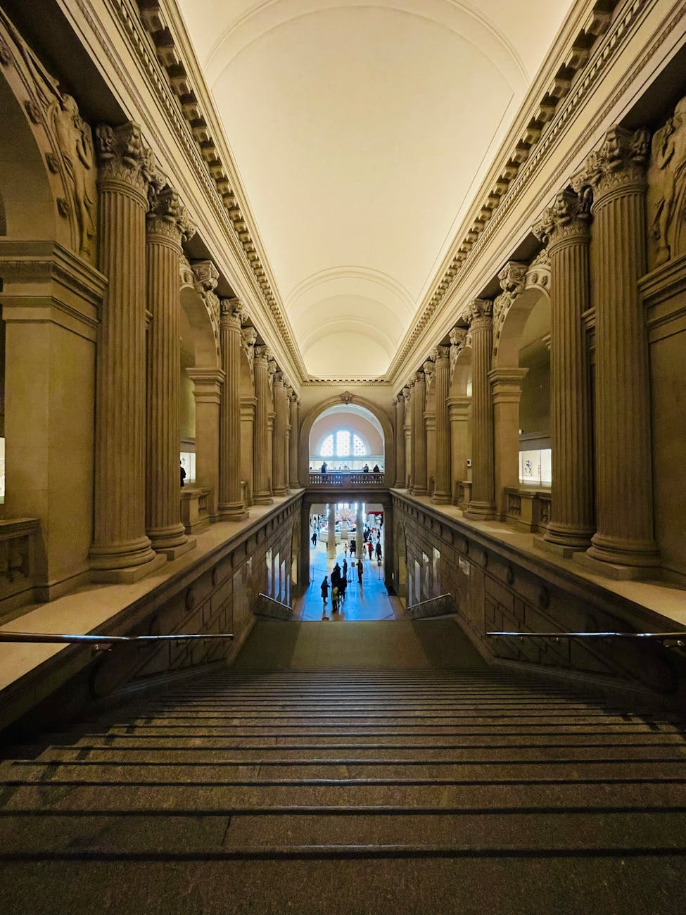 symmetrical view of the interior of the metropolitan museum of art in new york