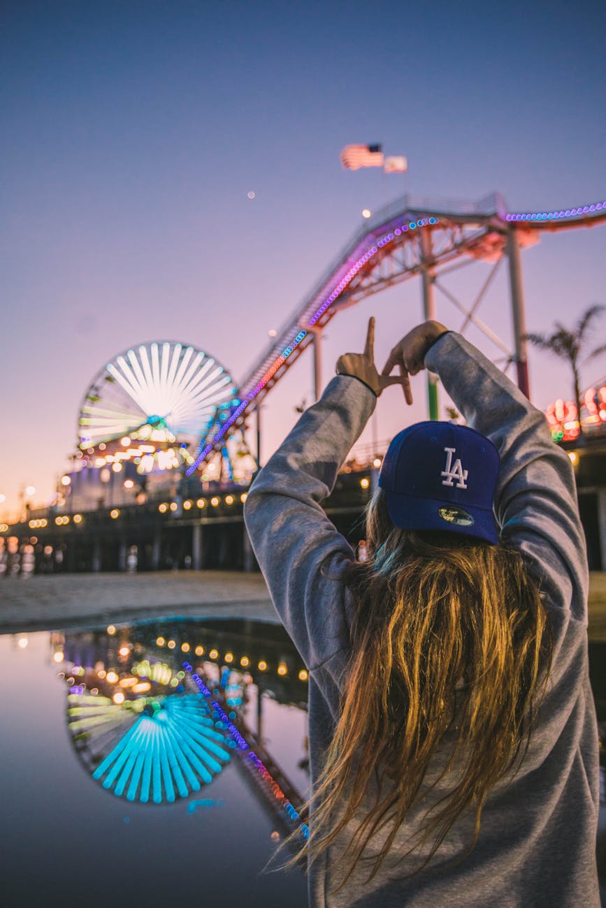 photo of woman doing hand sign