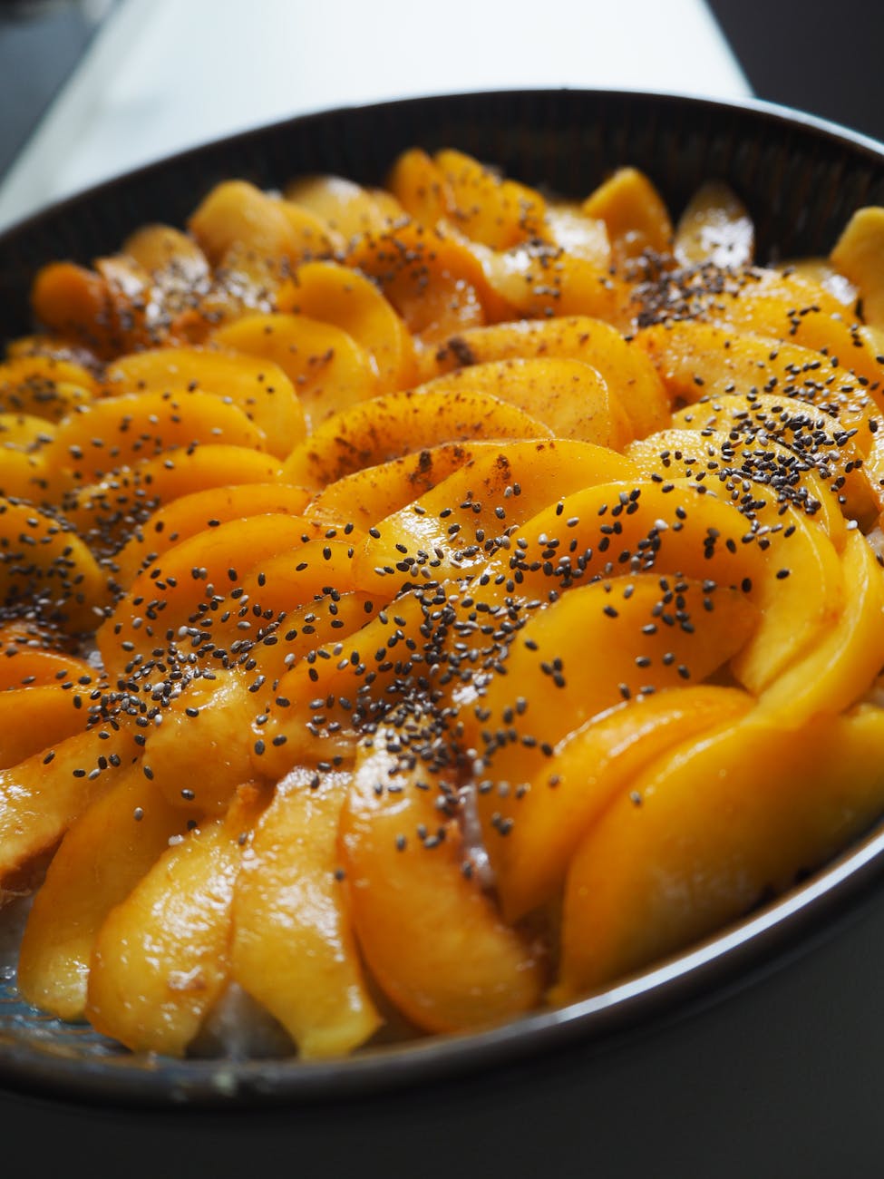 close up of a cake with peaches