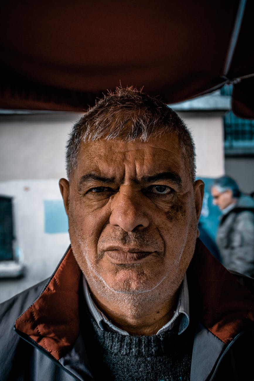 a man in blue jacket