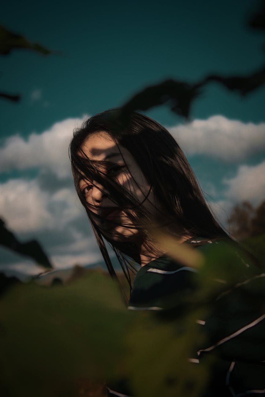 woman wearing black and white striped top