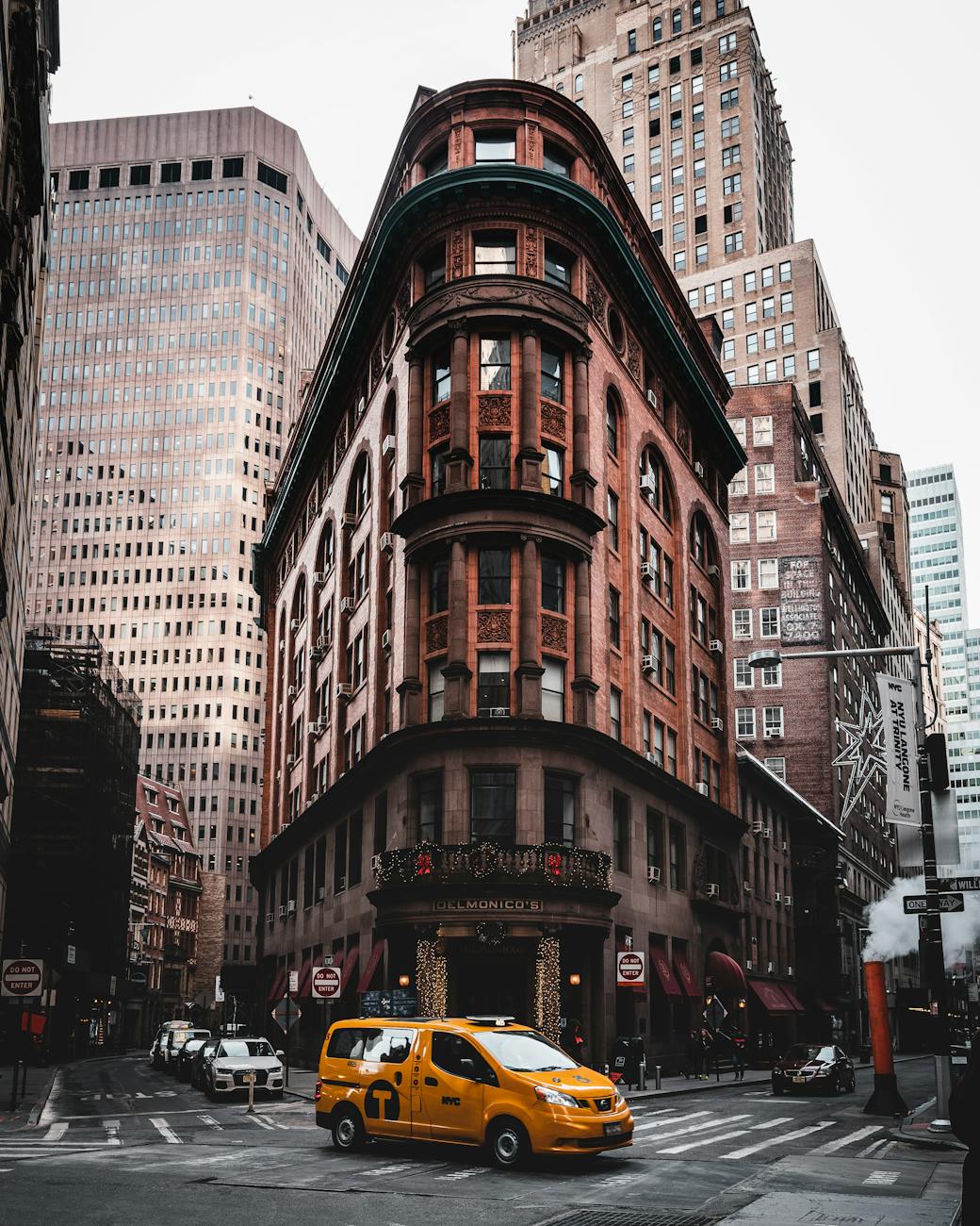 yellow van on road near building