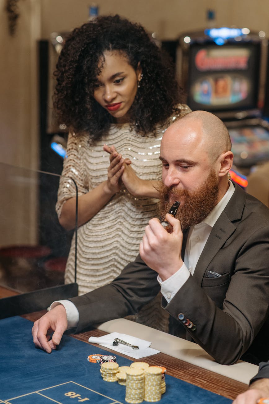 a man and woman gambling in the casino