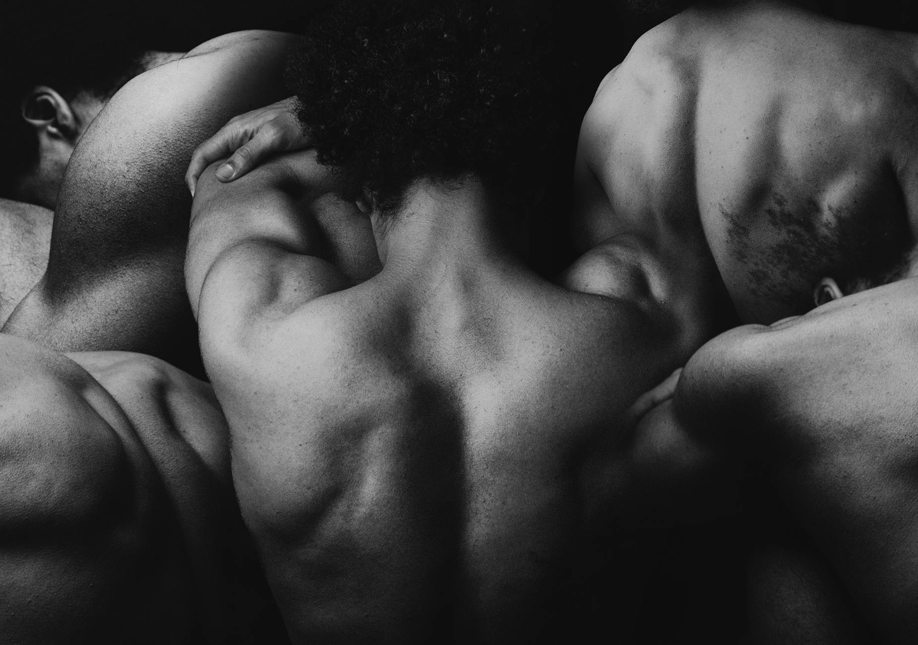 black and white artistic collage of back of a man