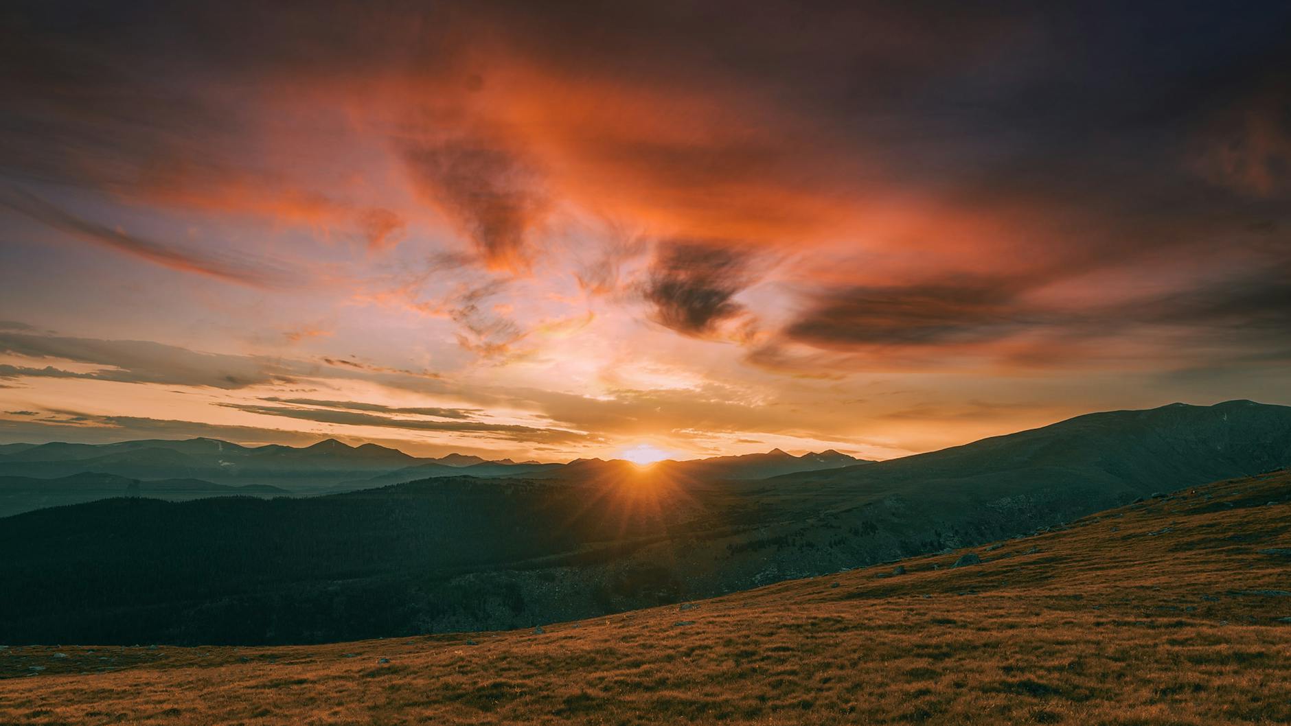 silhouette of mountains during sunset