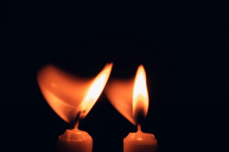 lighted candles in dark room