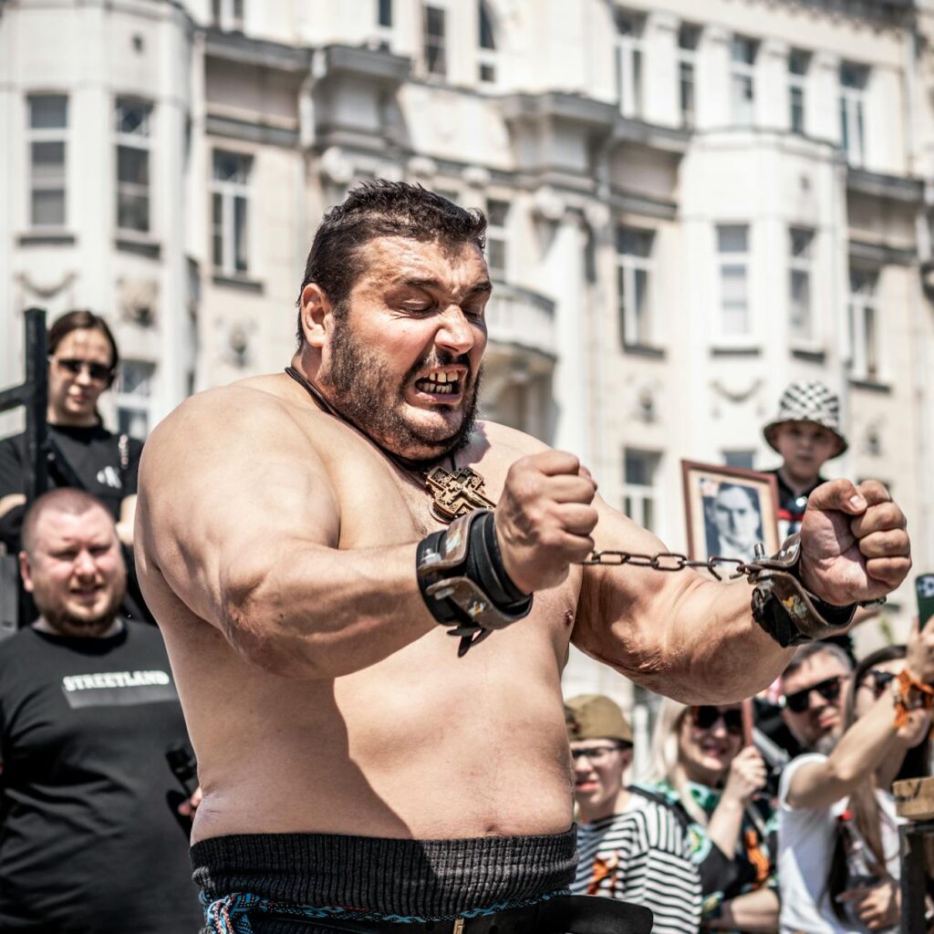 a man breaking a chain