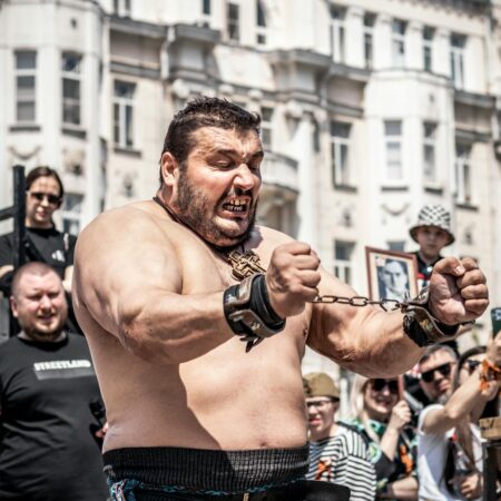 a man breaking a chain
