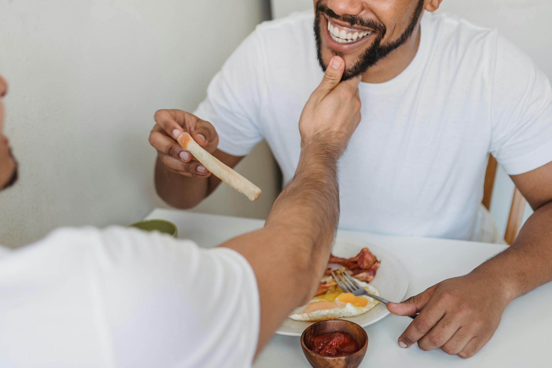 man holding chin