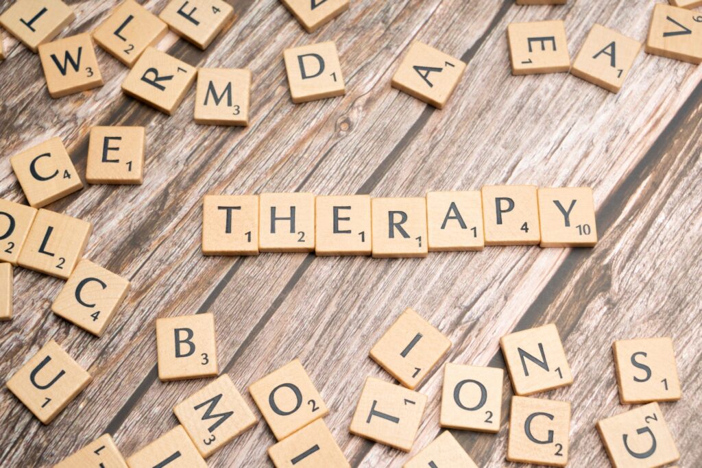 the word therapy spelled out in scrabble letters